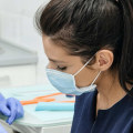 Where do dental assistants work?