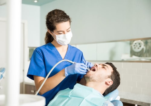 Can dental assistants clean teeth?